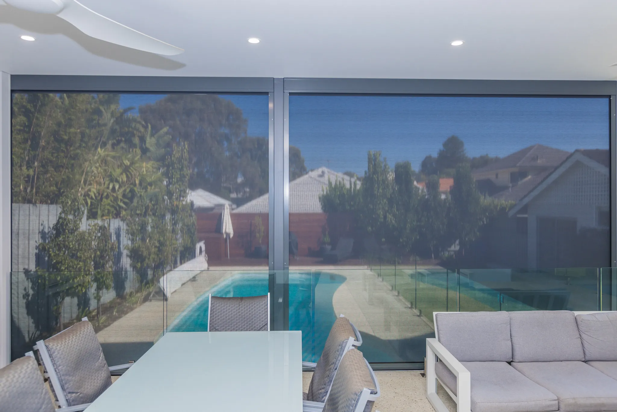 Slidetrack outdoor blinds enclosing a poolside alfresco in Floreat