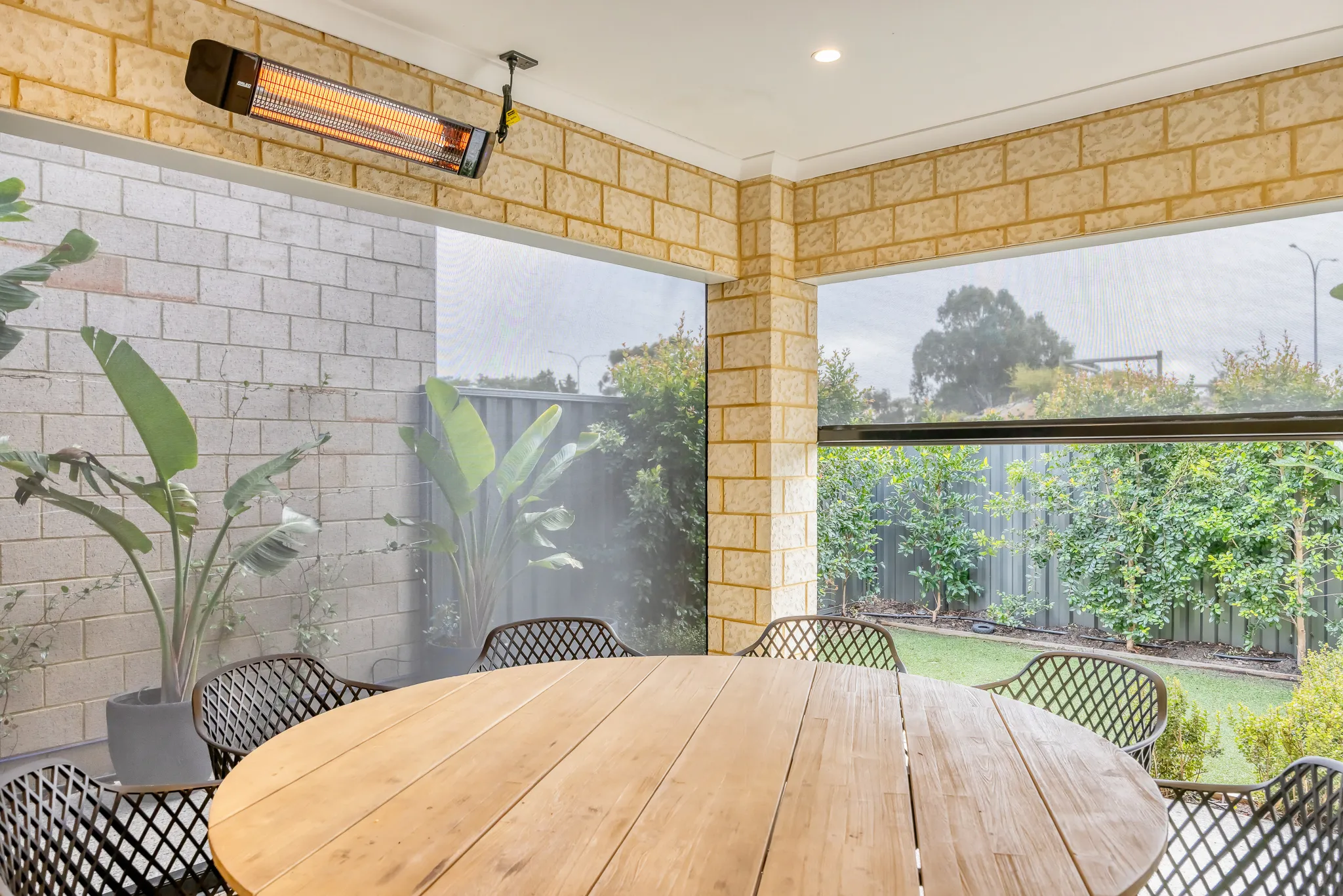 Ziptrak blinds enclosing a brick alfresco in Treeby