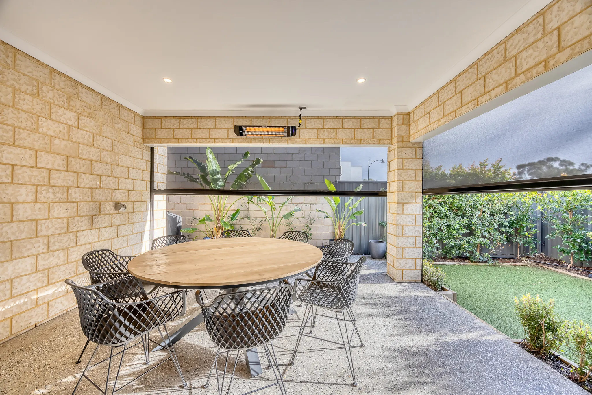 Ziptrak blinds enclosing a brick alfresco in Treeby