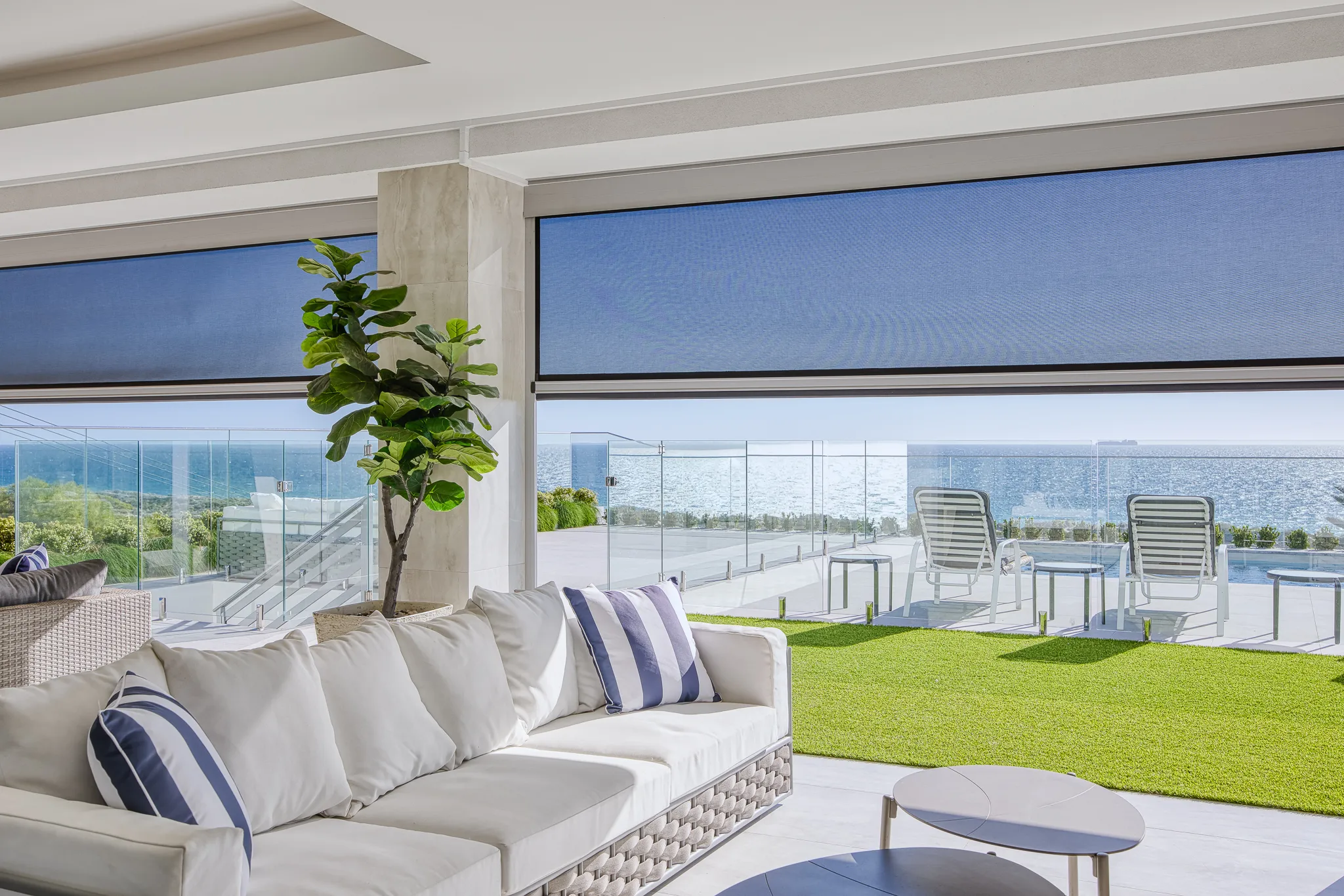 Ziptrak blinds along the pool terrace of a City Beach home