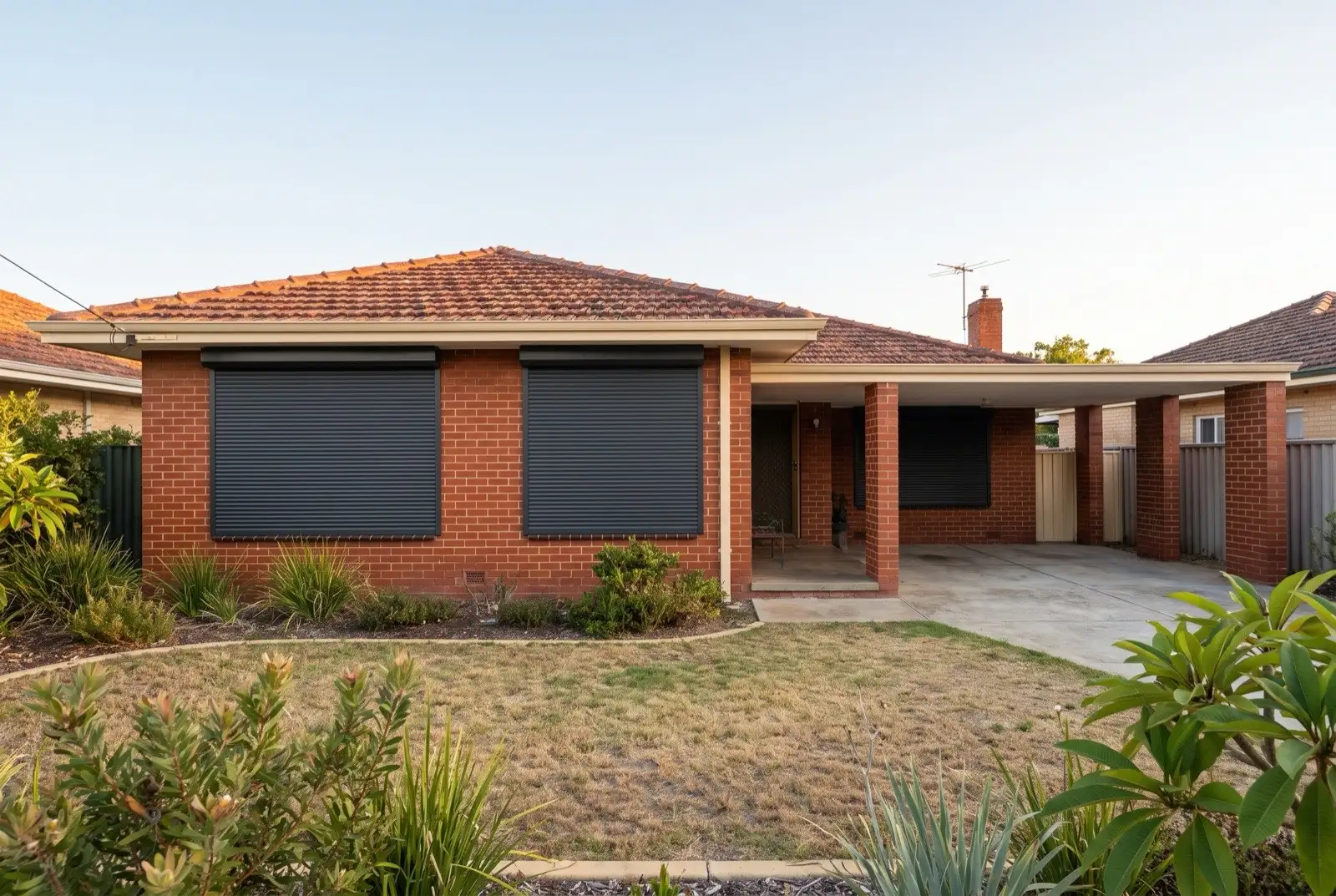 Illustration of charcoal roller shutters on a 1950s brick and tile house