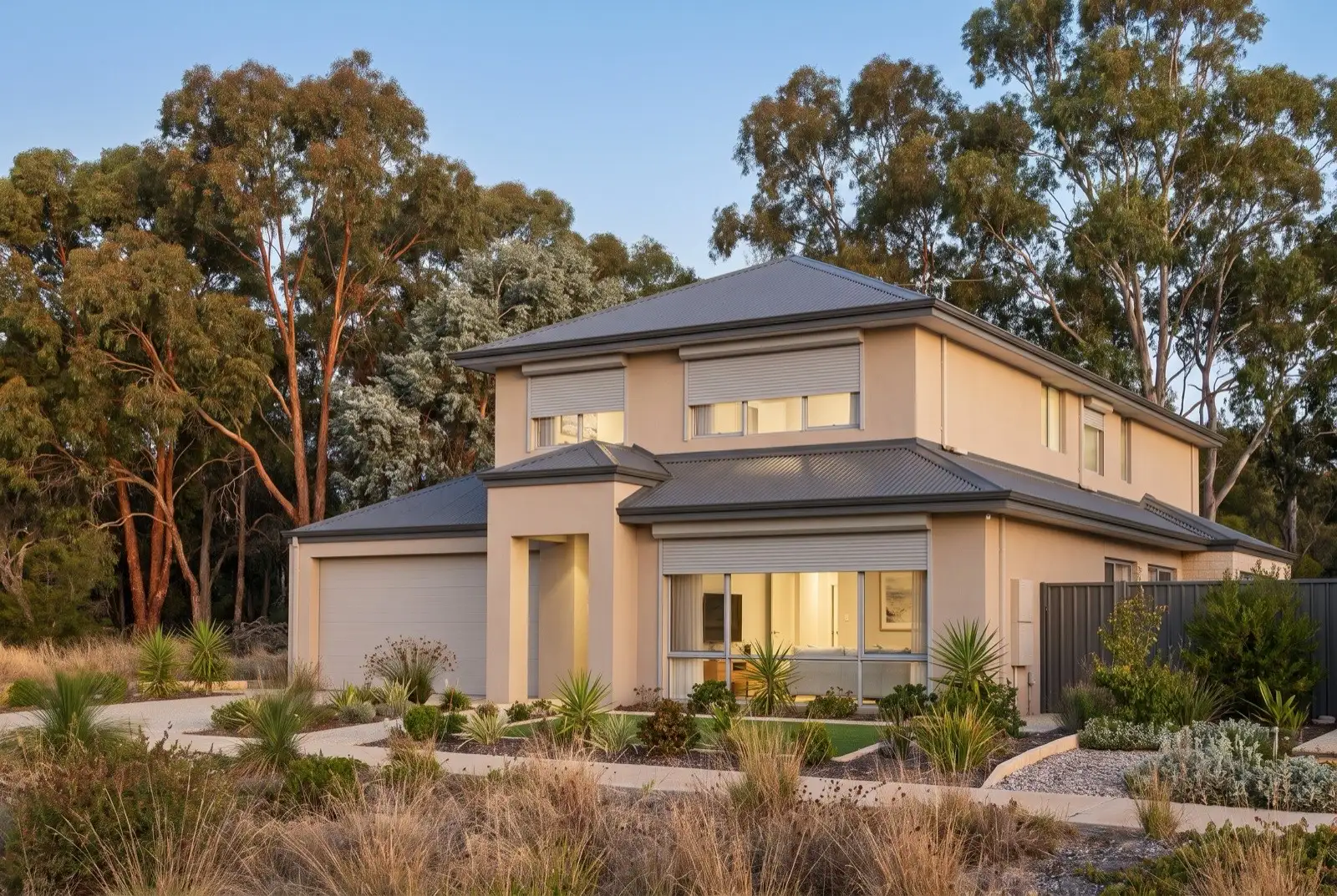 Illustration of mid grey roller shutters on a modern two storey house on a bush block