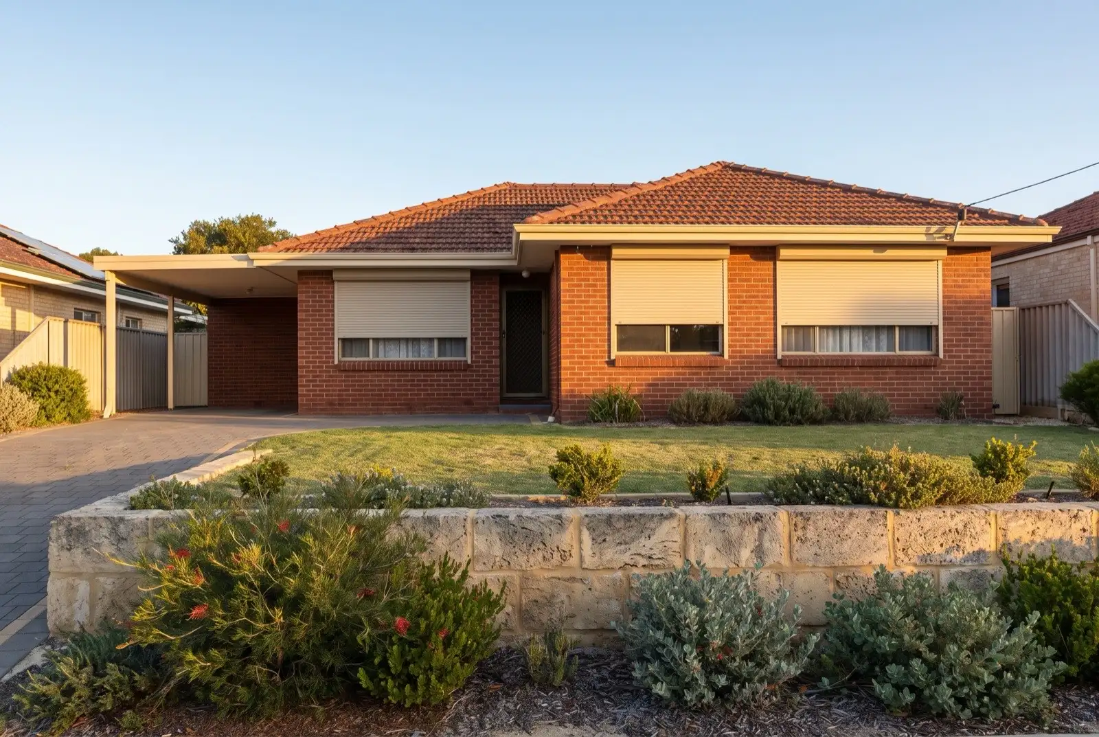 Illustration of warm beige roller shutters on a 1950s brick and tile house near the coast