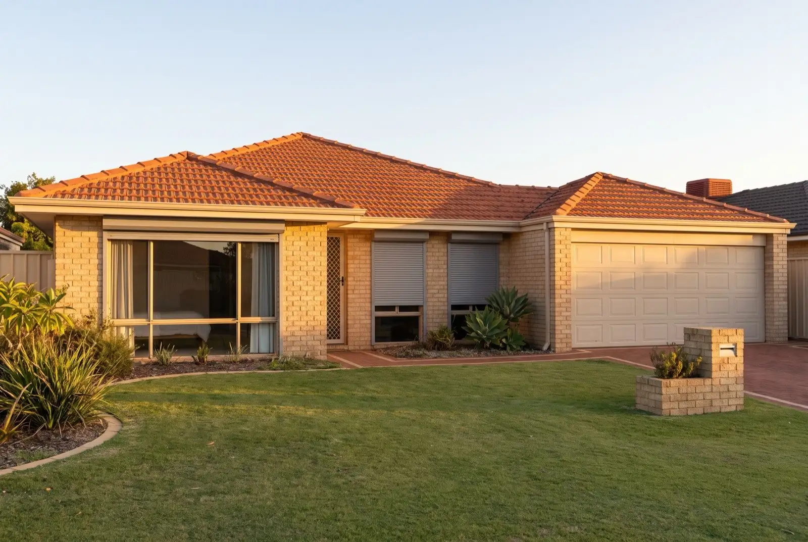 Illustration of mid grey roller shutters on a 1990s brick house