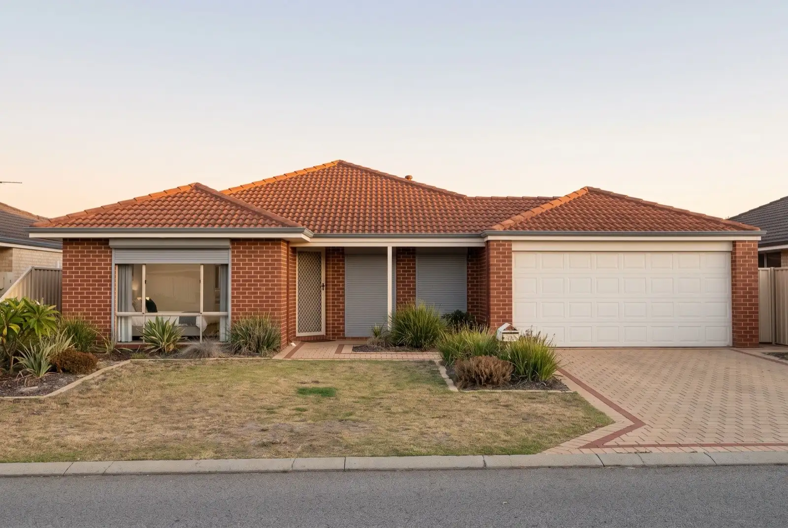 Illustration of mid grey roller shutters on a 1990s brick house