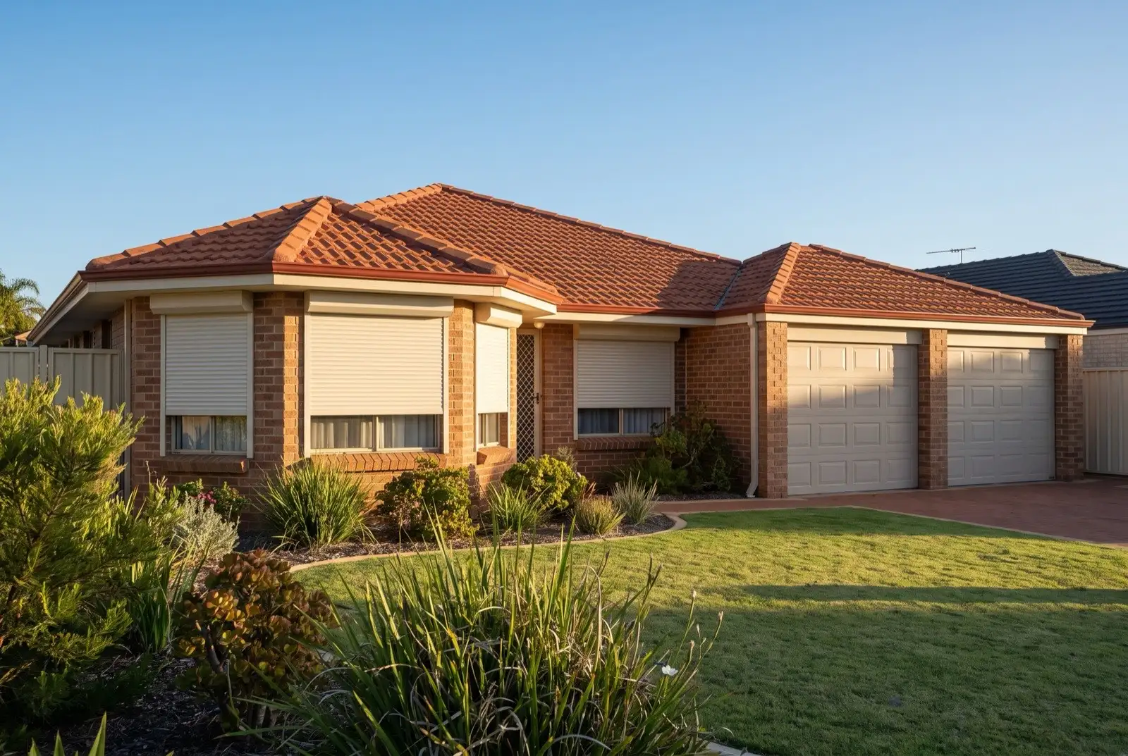 Illustration of off-white roller shutters on a 1990s brick house
