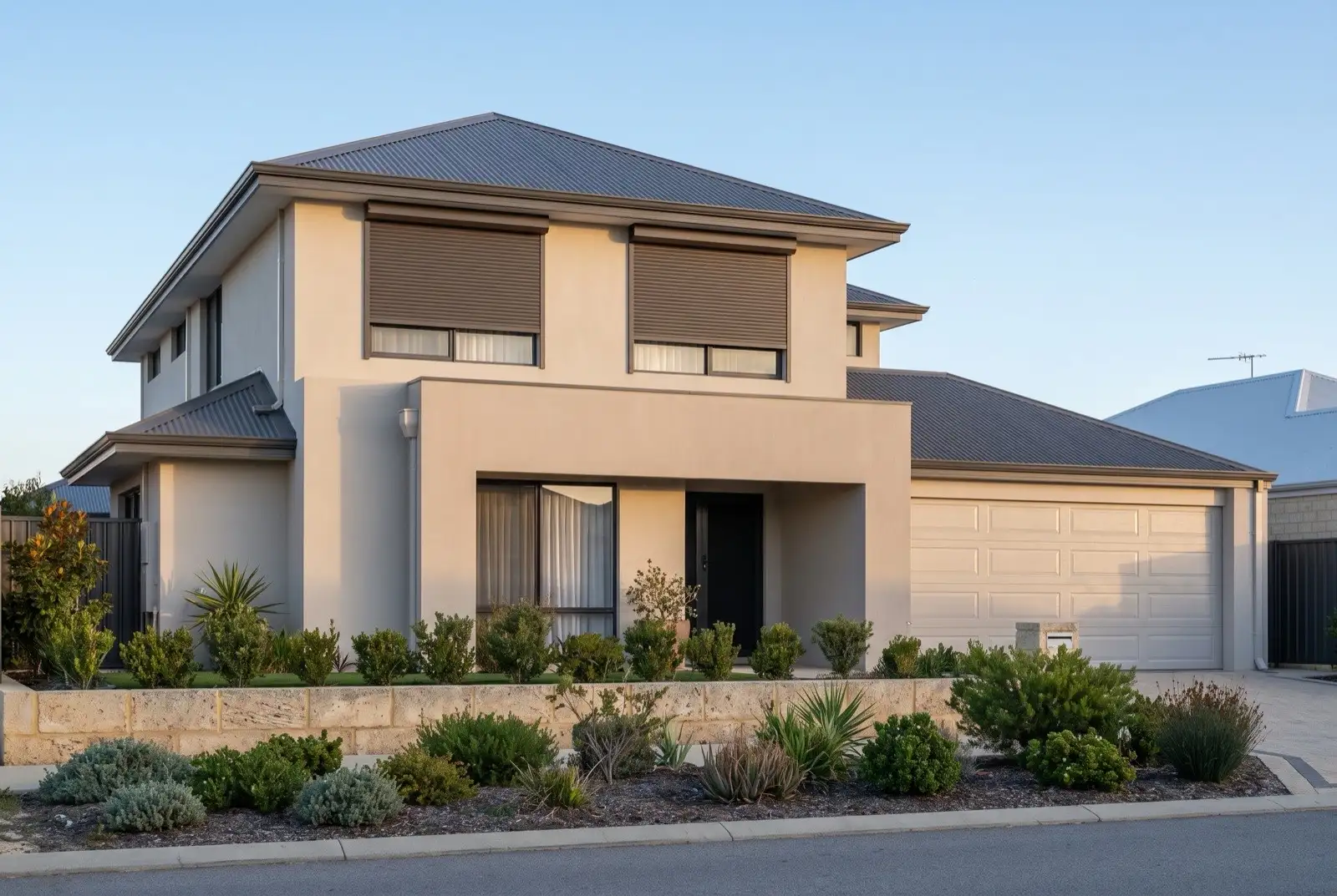 Illustration of dark bronze roller shutters on a modern two storey house near the coast