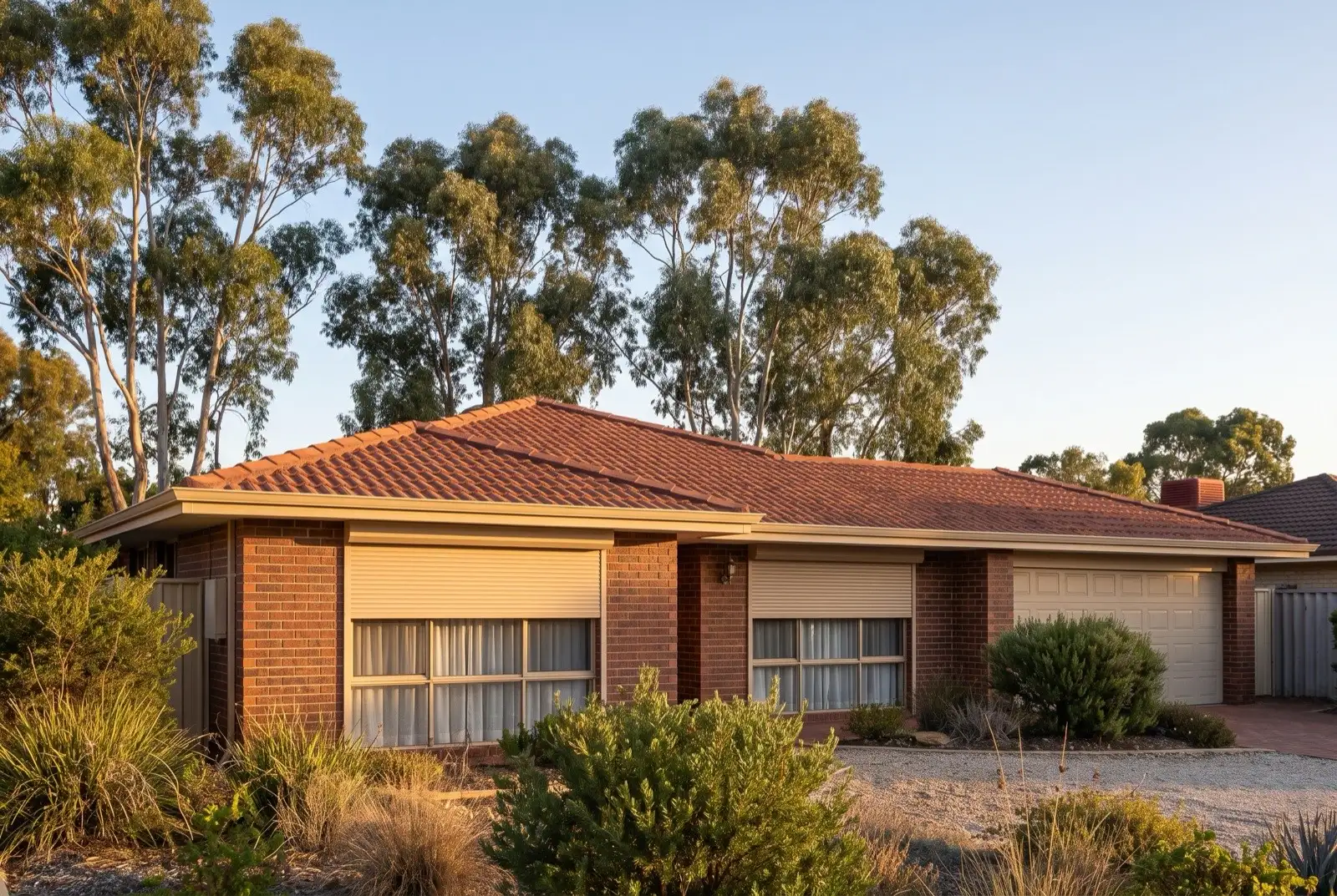 Illustration of warm beige roller shutters on a 1990s brick house on a bush block
