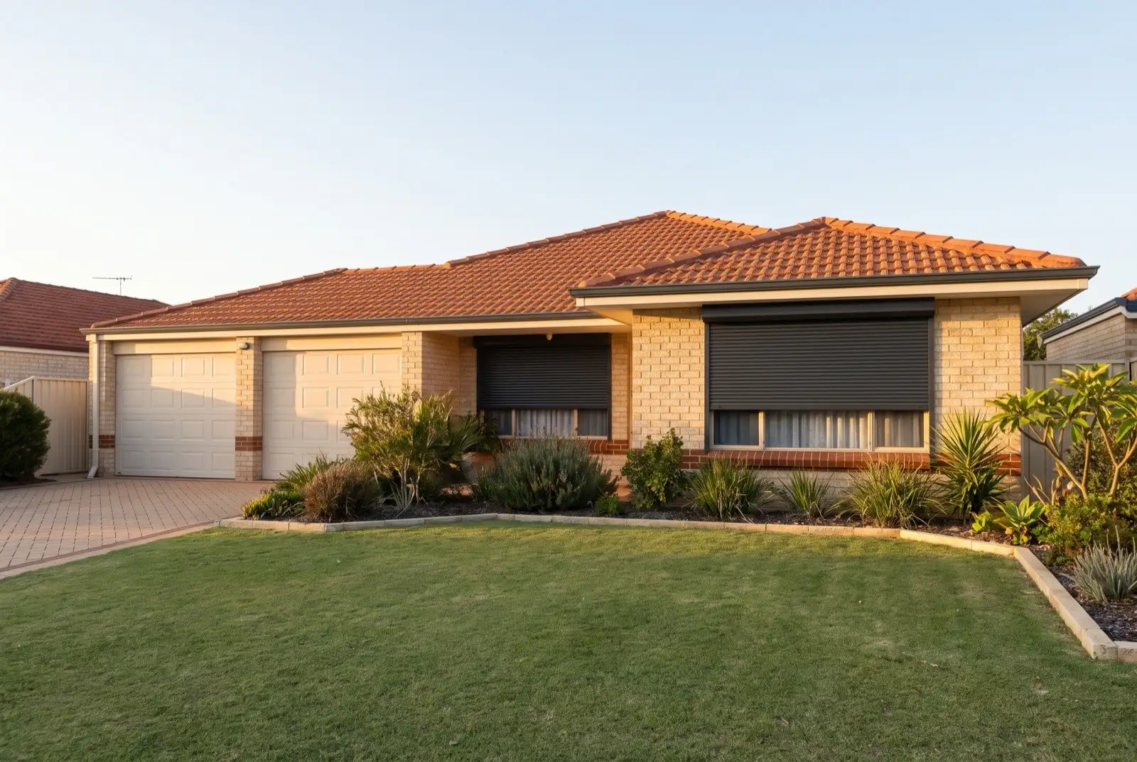 Illustration of charcoal roller shutters on a 1990s brick house