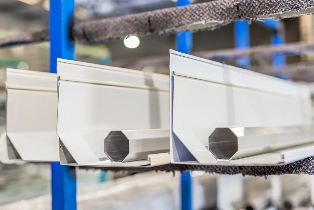 Freshly made cream roller shutter pelmets on the factory rack