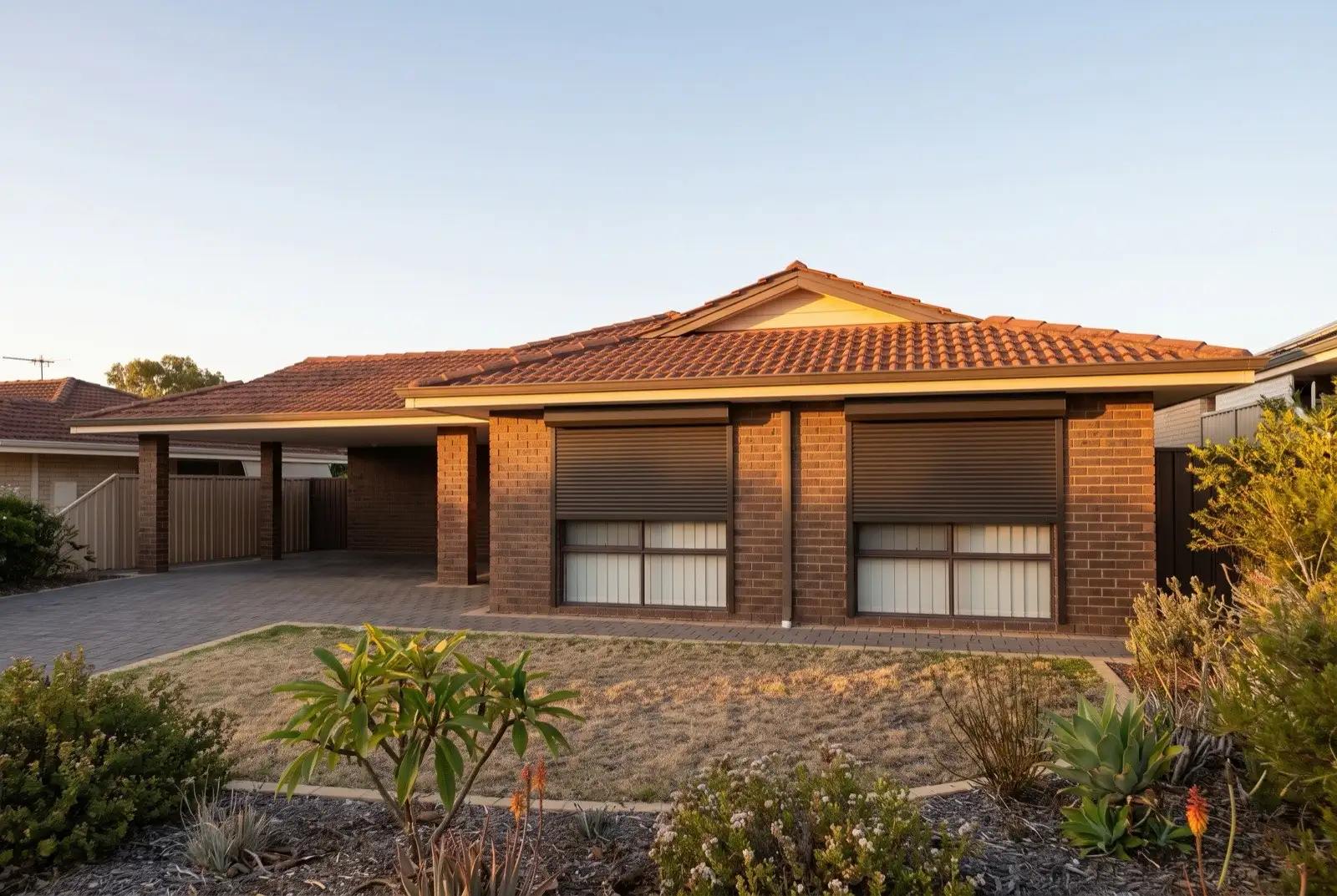 Illustration of dark bronze roller shutters on a 1970s brick house